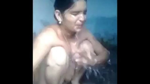 Indian milf bathing and showing her beautiful pussy