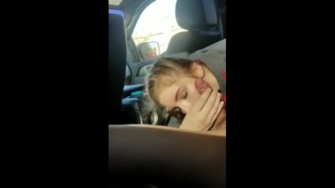 Blonde college girl with braids sucks cock in the car