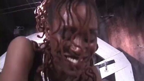 Slim ebony dominatrix pleasures a horny dude in the dungeon