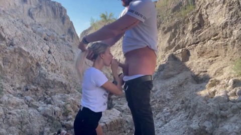 gave his cock in the mouth of a beautiful blonde outdoors in a canyon